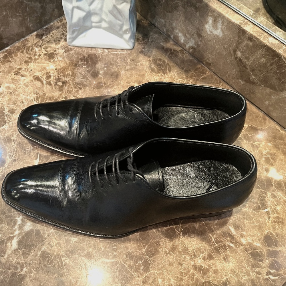 Black whole-cut lace-ups size 9